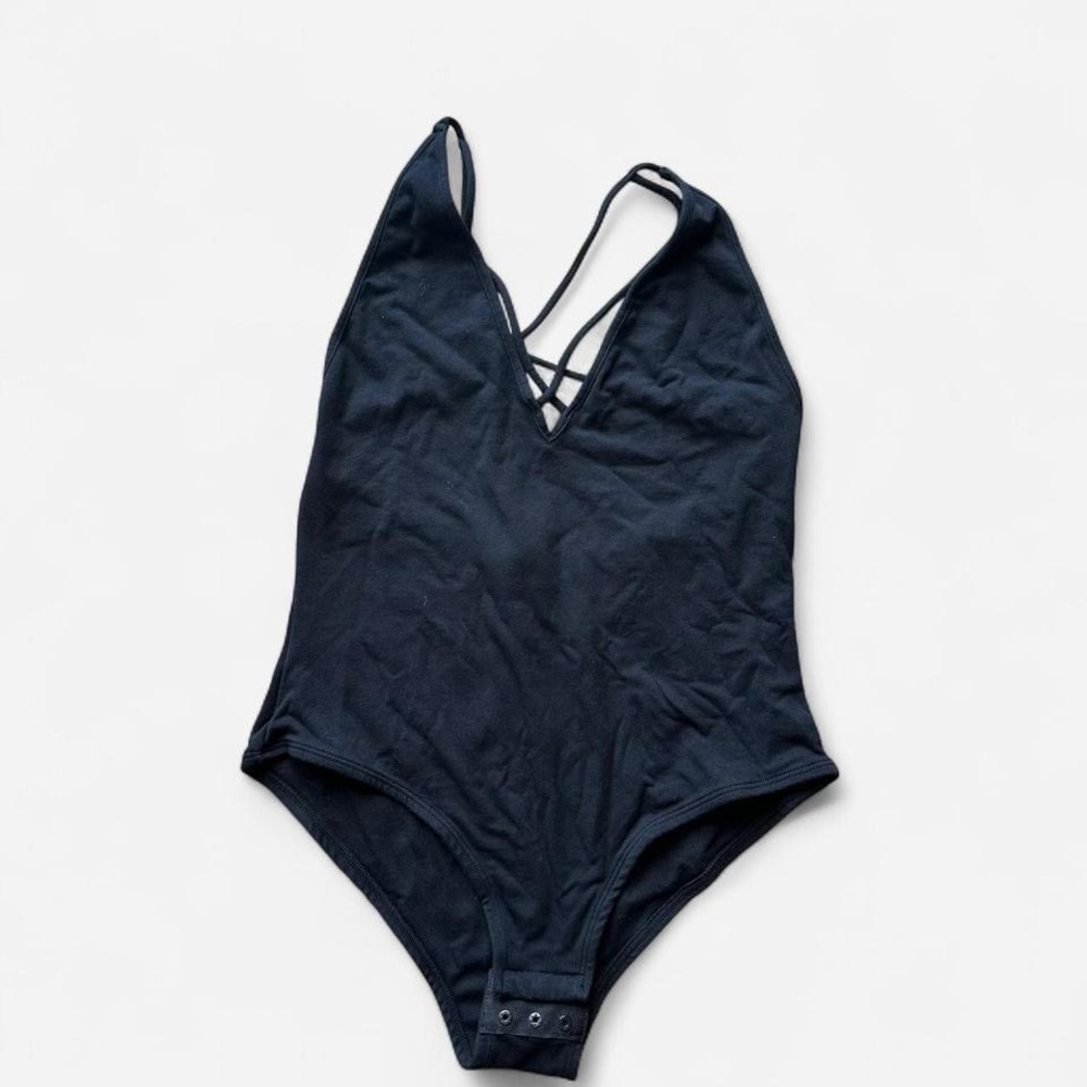Sam Edelman black strappy bodysuit in size medium
